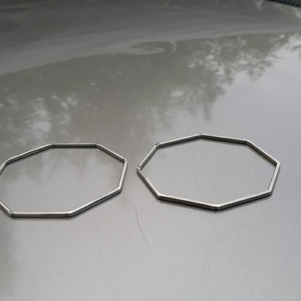 Two Hexagonal Silver Bangle Bracelets